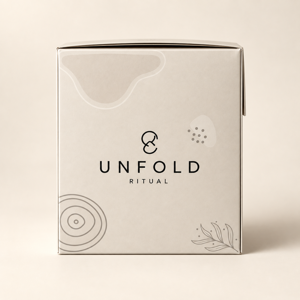 Studio side profile of the UNFOLD RITUAL box showing its organic line motifs